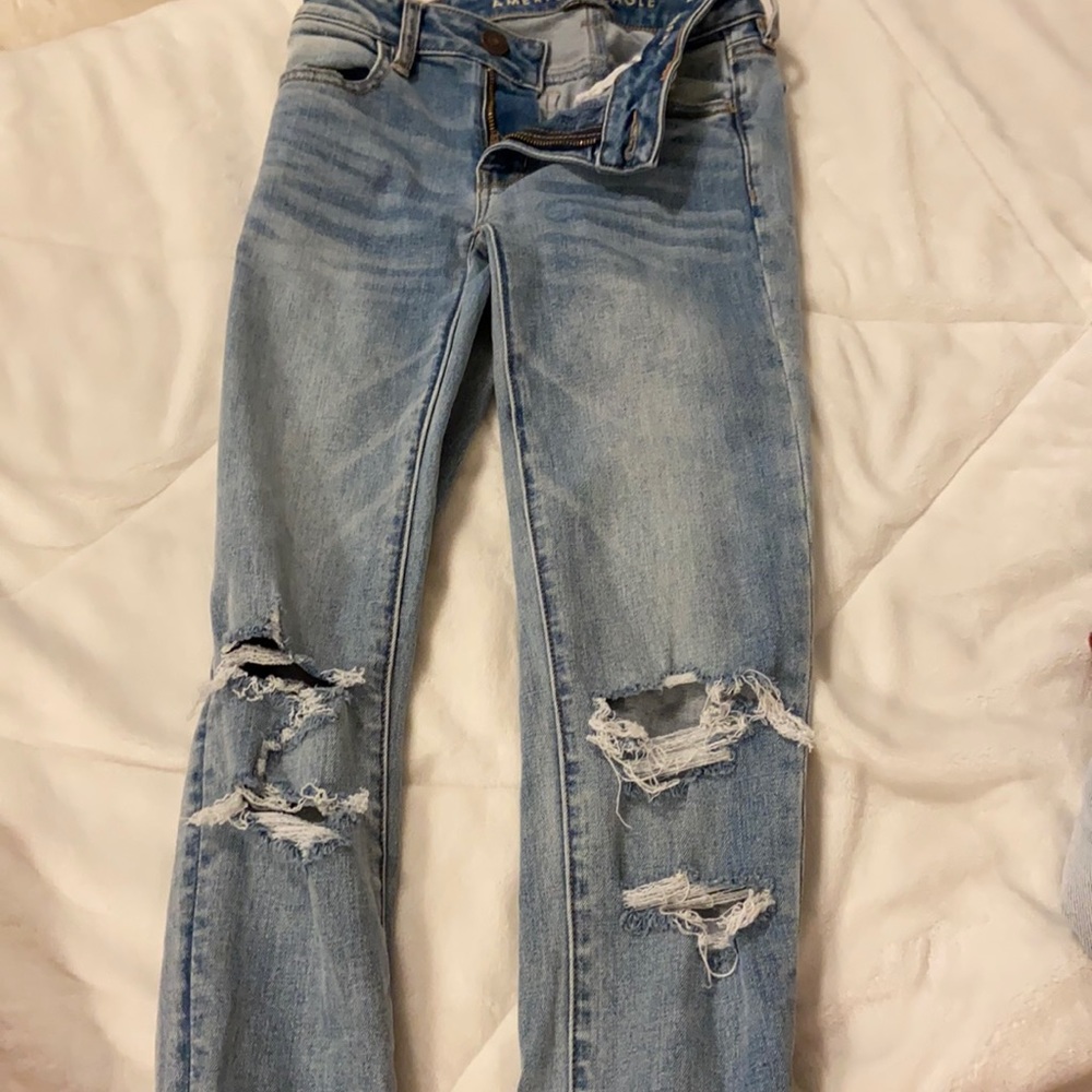 stretchy american eagle blue ripped jeans
